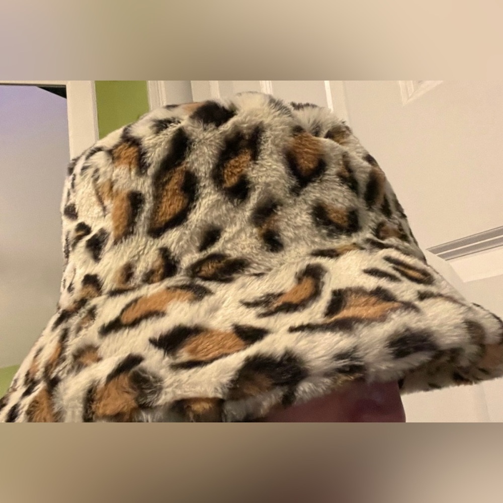 Adjustable fuzzy cheetah bucket hat